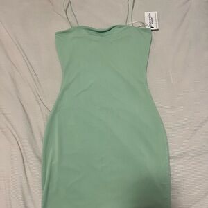 Light green, stretchy mini dress